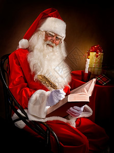 书上写字的上圣诞老人图片