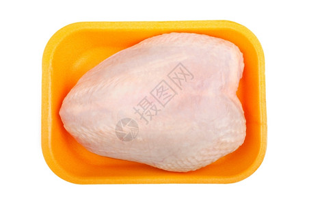 黄色的白以背景隔离的塑料托盘中原鸡胸营养图片