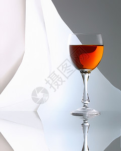 红酒杯色的白一杯葡萄酒白抽象背景的葡萄酒图片