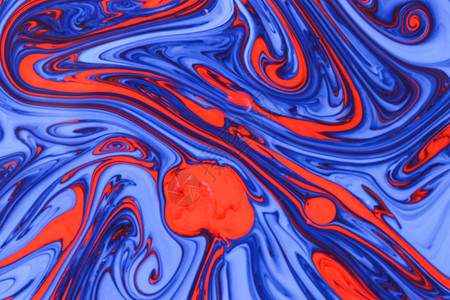 质地抽象的手工制作蓝色和红大理石底背景图片