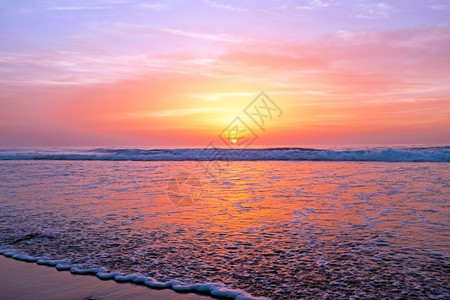 大西洋谷普拉亚葡萄牙海滩的日落图片