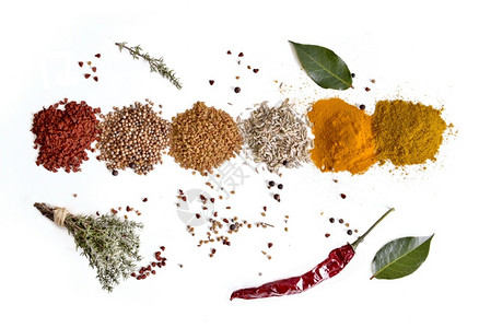 调味料白色背景百里香和胡椒的印度粉末香料堆的顶视图叶子烹饪图片