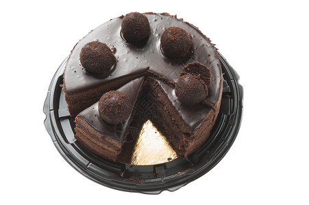 美食物蛋奶酥白色背景上孤立的巧克力蛋糕饼图片