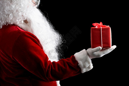 圣誕老人手套拿着礼品盒克劳斯圣诞节庆典图片