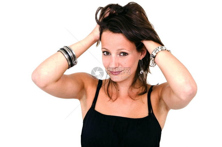 戏弄感的年轻女人用手从头发上摸可爱的图片