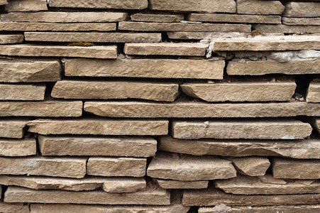 大理石砂岩作为背景的灰色和棕石块瓷砖自然图片