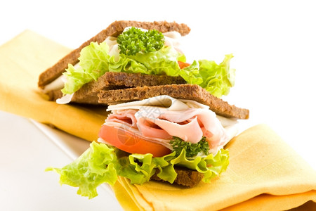 一顿饭照片美味的大起司和火腿三明治白色孤立背景的生菜白色莴苣背景图片