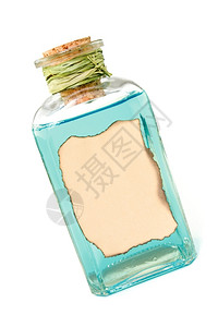 瓶子玻璃白色背景上含有蓝液体的瓶装毒图片
