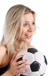 美丽的人们拥有足球的吸引力年轻女子运动背景图片
