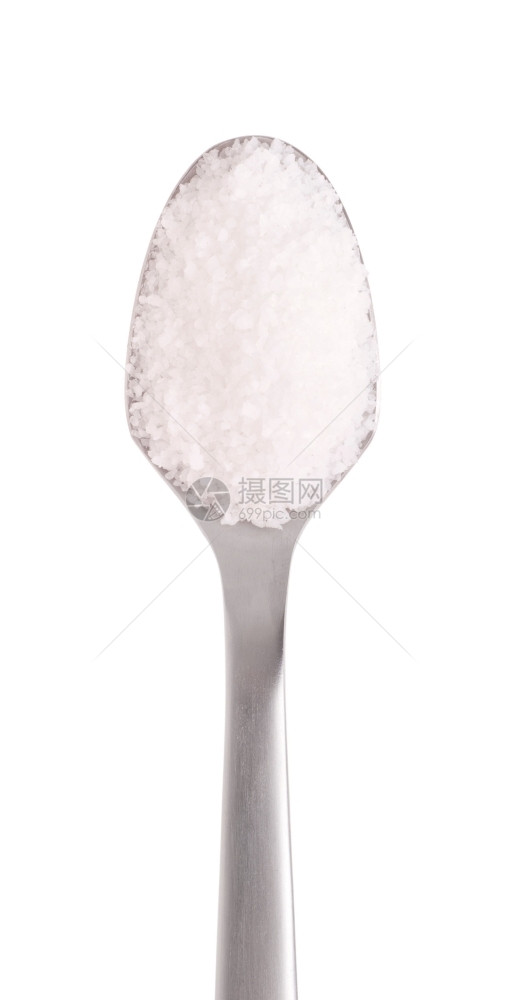 香气干燥热的不锈钢勺上咸盐香料白底孤立的不锈钢勺图片