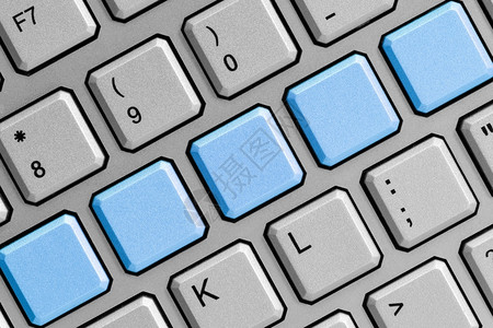 电脑现代的工具键盘关闭时的空白蓝色按钮图片