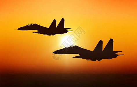 日落背景喷气战斗机士飞行员高清图片