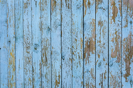 去皮古老的有风气蓝色木制板栅栏纹身排蓝色的背景图片