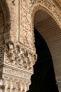艺术的通道弧在装饰品过时用石头雕刻的摩尔语拱门图片