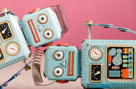 古老的复机器人锡玩具未来派脸自动化蓝色的高清图片素材