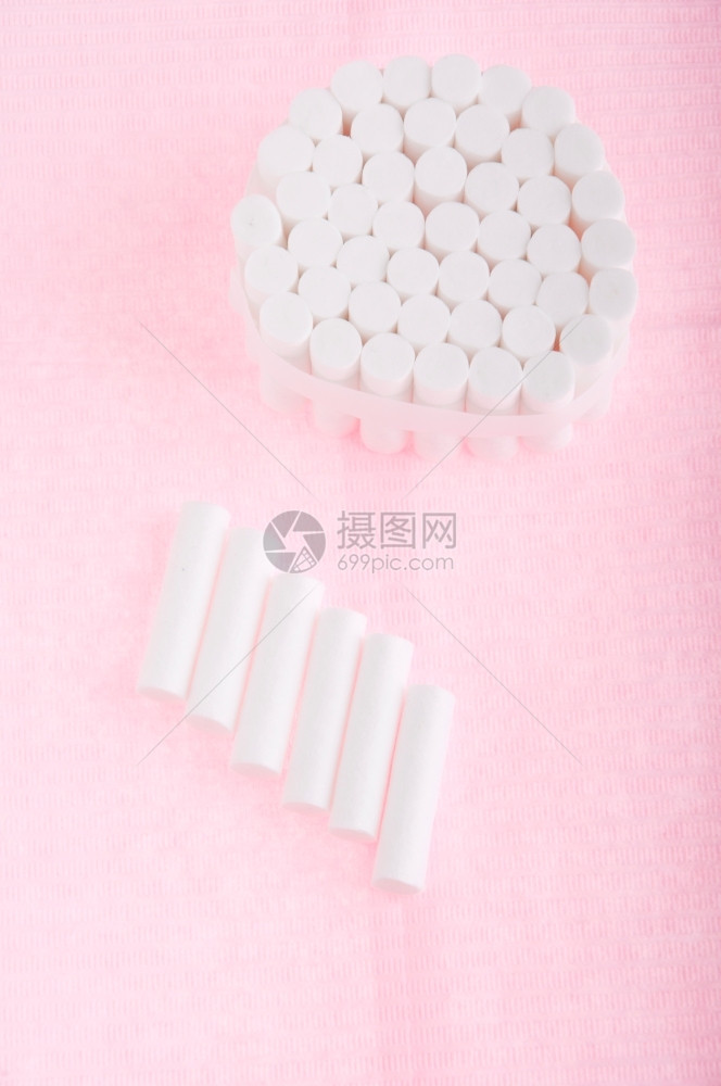 劳斯莱棉布使用粉红色双叶笔记牙医设备的科棉花卷一种图片