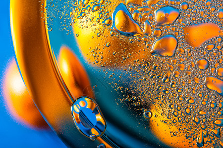 蓝色和橙油滴的背景蓝色和橙油滴的背景美丽抽象墙纸图片