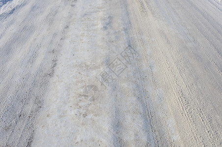 农村天寒冬日雪地乡村公路背景的封闭白色图片