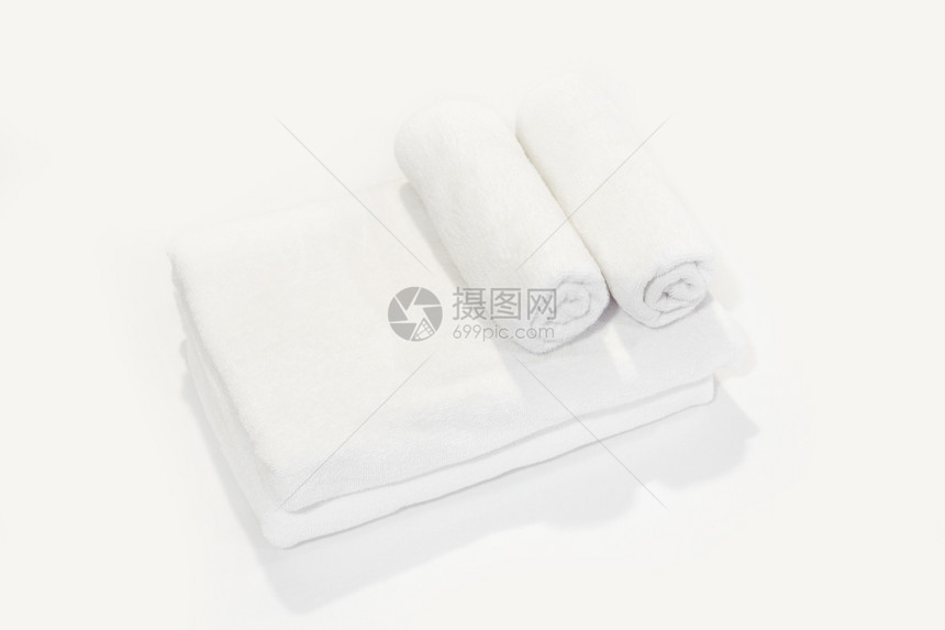 套房放松织物白色背景的浴巾图片