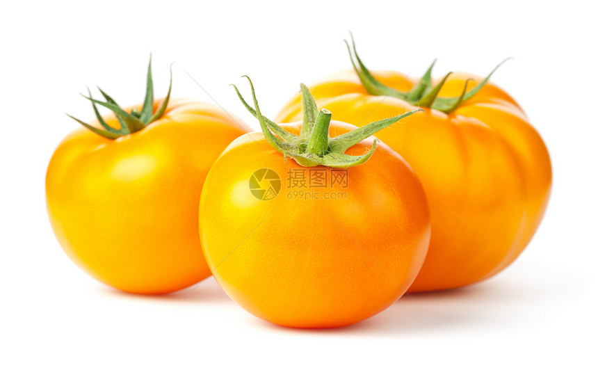 食物白色背景上孤立的三种黄番茄绿色白的图片