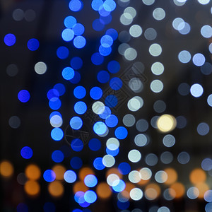 蓝色的丰富多彩夜生活圣诞灯不突出焦点的抽象色彩多bokeh背景背景图片