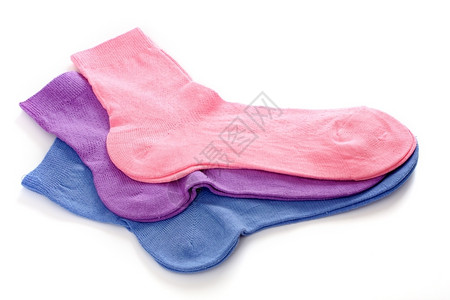针脚地面白底蓝和粉红色袜子鞋类高清图片