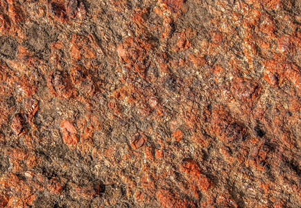 具有粗糙表面的红花岗岩摘要背景粗糙的颜色岩石图片