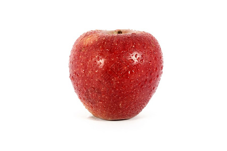有机的饮食清红苹果用水滴开在白色上隔绝的图片