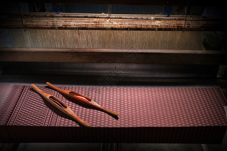 泰丝绸国传统编织机卷轴穿梭图片