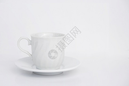 白色背景的旧陶瓷咖啡杯和茶碟白色的处理饮料图片