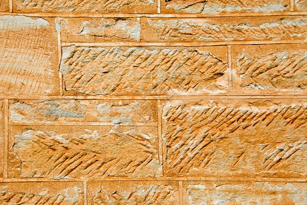 难的粗糙岩石一座历史教堂的沙石墙图片