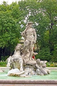 雕像花园巧Karlplatz附近旧慕尼黑植物园的海王星雕塑图片