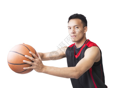 篮球运动员拿着篮球图片