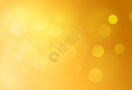 黄色bokeh抽象光背景黄色的闪明亮图片