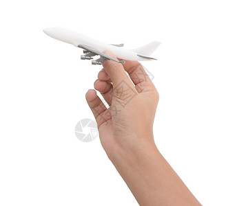 白色背景上孤立的手持飞机玩具模型手持飞机玩具模型旅游行商业图片