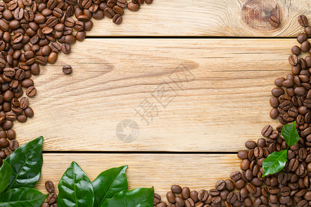 咖啡豆和树叶背景背景图片