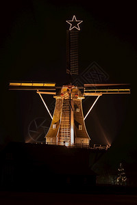 旋转灯芯古风车Venemansmolen圣诞节灯光粮食图片