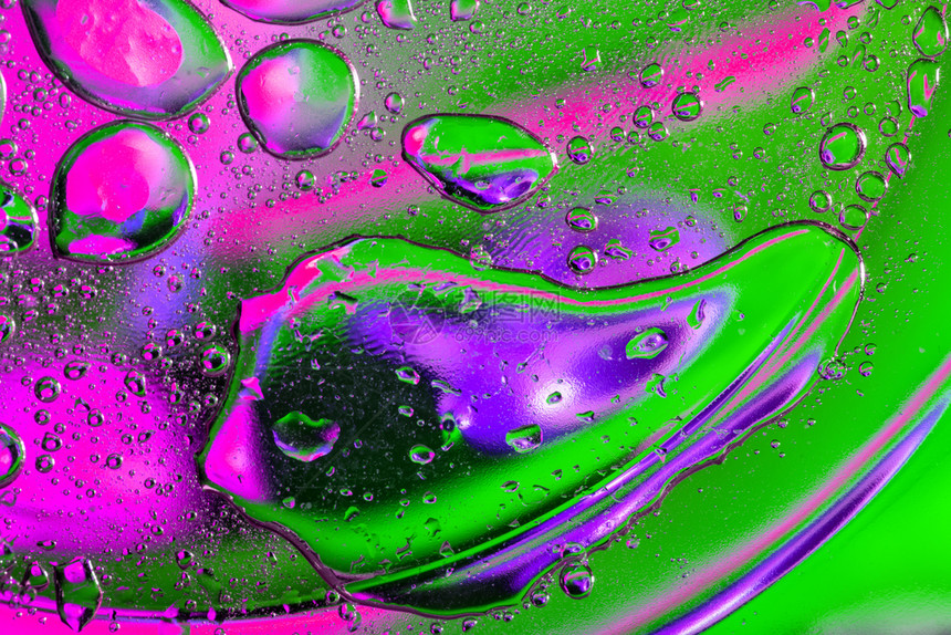 紫色的音调墙纸和绿调中混沌方式的油滴背景紫色和绿调中混沌方式的油滴背景图片
