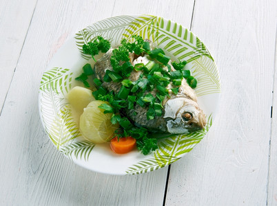 菜肴午餐盘子鱼头食料的海鲜菜图片
