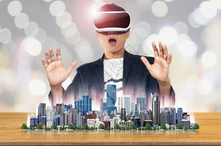 科学创新双倍曝光男人戴虚拟现实眼镜未来技术的概念人与虚拟现实护目镜的虚拟现实风背景图片