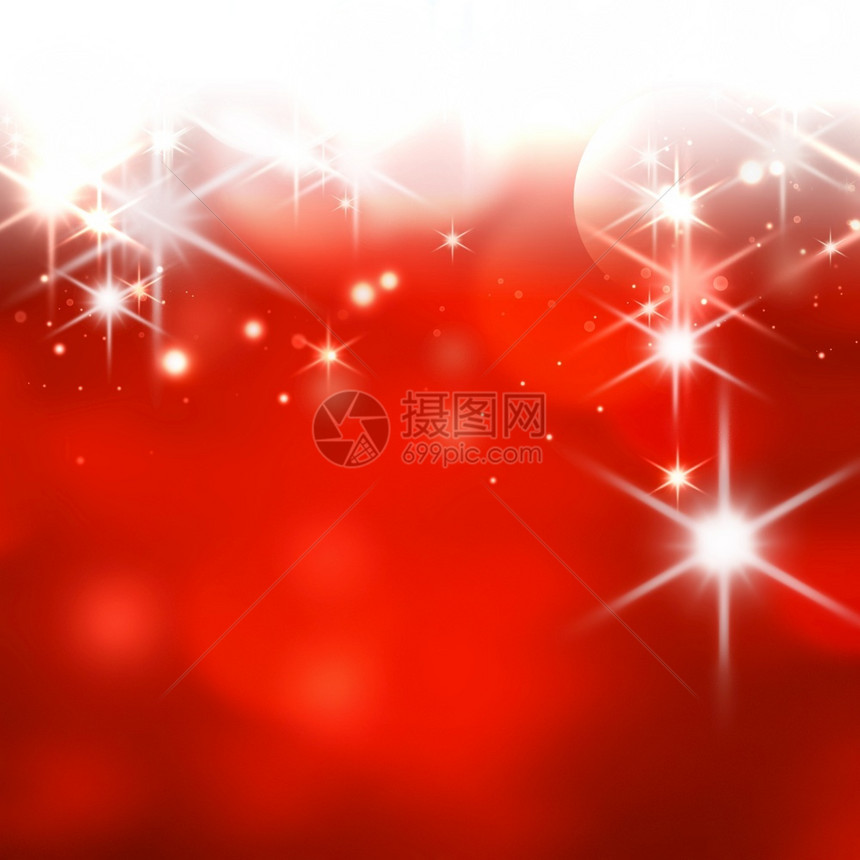 抽象的丰富多彩火花圣诞红背景带有bokeh效应图片