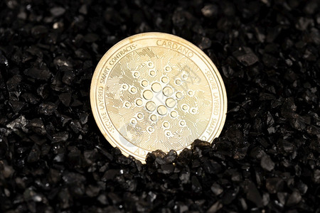 黑砾石纸上的卡德诺硬币加密货连锁资金交换支付贸易图片