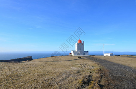 建筑学冰岛Dyrholaey灯塔上的阳光蓝天维克色的图片