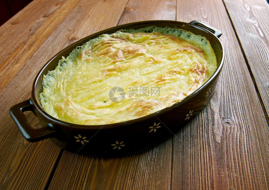 Imellettyperunalaatikko来自Kymenlaakso的甜土薯锅炉传统芬兰菜土豆馅饼素食主义者图片