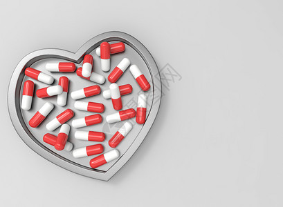 卫生保健3d将白色和红药丸胶囊装在心脏钢盘上带有复制空间灰色背景的爱健康概念药品渲染背景图片