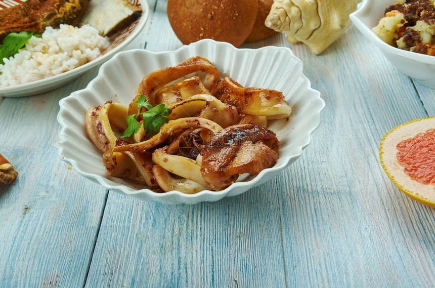 厨师AdobongPusitSquidAdobo菲律宾烹饪传统菜类一顿饭图片