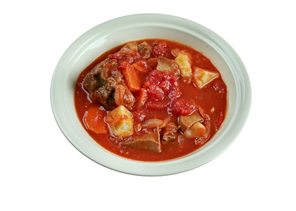 羊肉番茄布丁南非炖菜肉桂卡达莫姜和丁香以及辣椒食物煮熟的背景图片