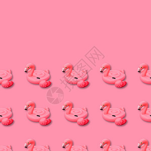 管子最佳出去粉红色火烈鸟无缝图案的游泳池玩具粉色底Flammingo充气式装有无缝模粉红底面Flamingo充气器被切开背景图片
