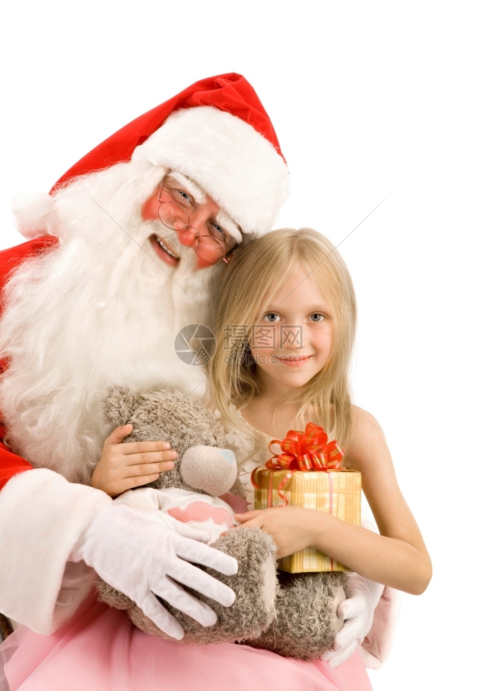 男士圣诞老人和礼物在白背景上快乐的小女孩抱白色的帽子图片