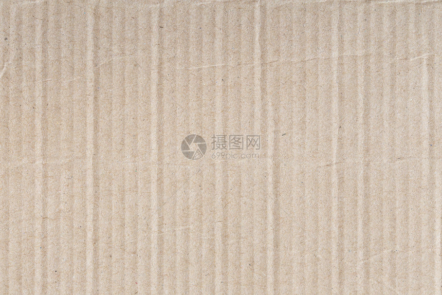 优质的皱瓦楞棕色纸盒是空的背面抽象纸板背景图片
